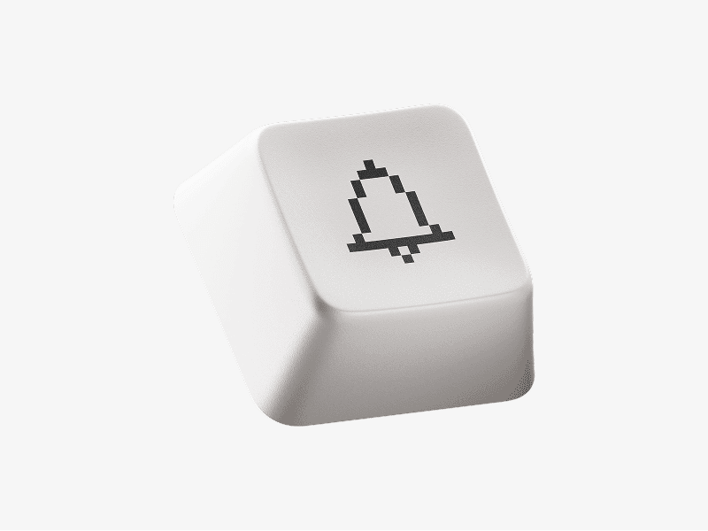White keyboard keycap with bell icon shown as a 3D illustration