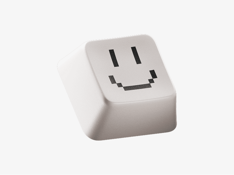Keyboard keycap with smiley face icon shown as a 3D illustration