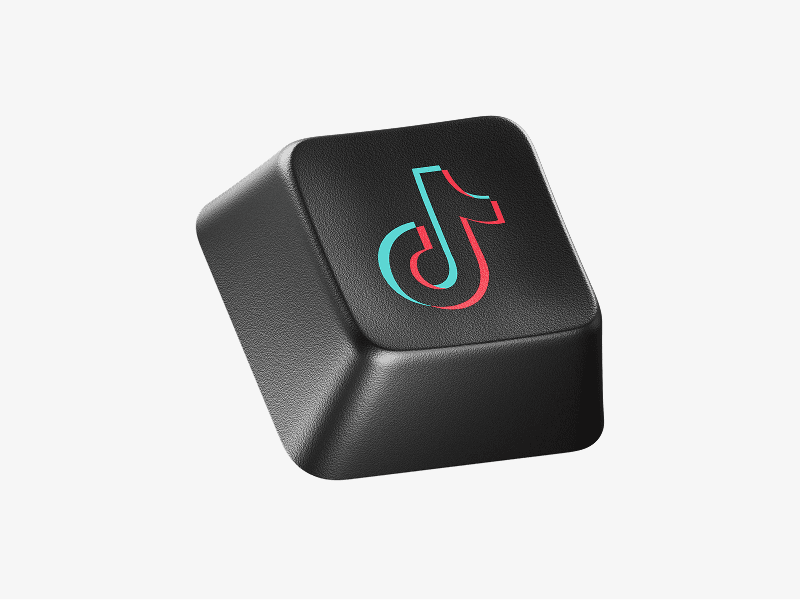 Black keyboard keycap with TikTok logo shown as a 3D illustration