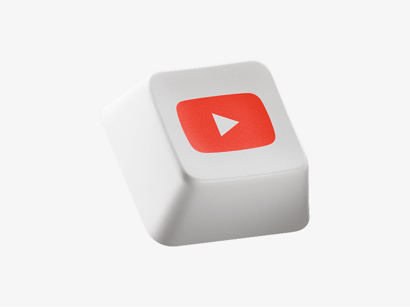White keyboard keycap with YouTube play icon shown as a 3D illustration