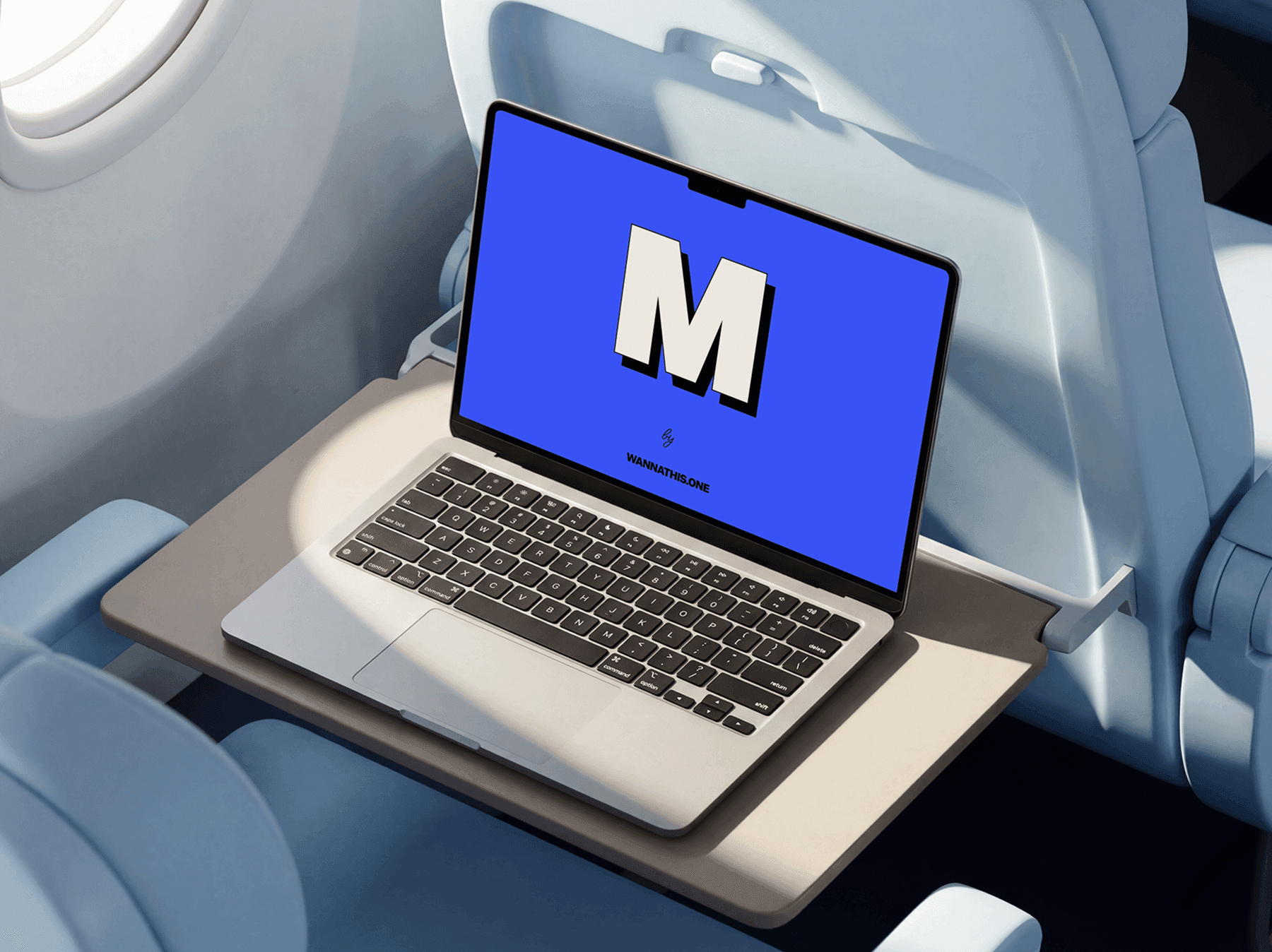 MacBook laptop mockup placed on an airplane tray table inside a refined modern passenger cabin scene