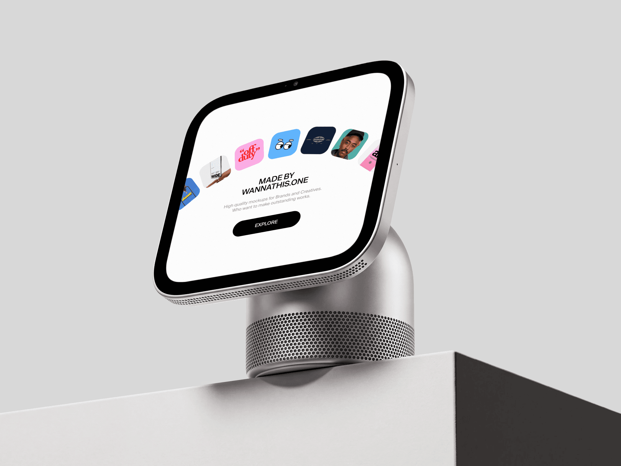 Free Apple HomeView mockup angled on a speaker base at the edge of a white table