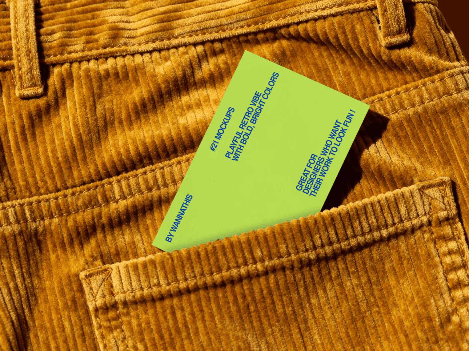 Minimal business card mockup with bold typography, realistic lighting and fabric texture