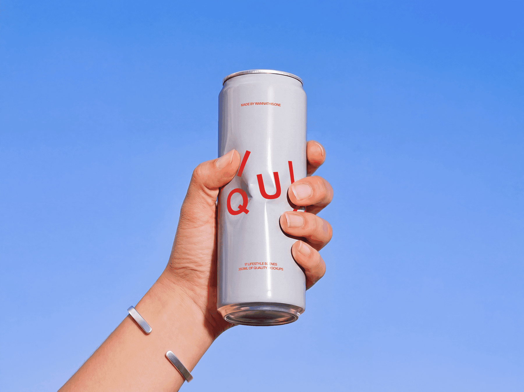 Slim beverage can mockup held in hand against a clear sky background
