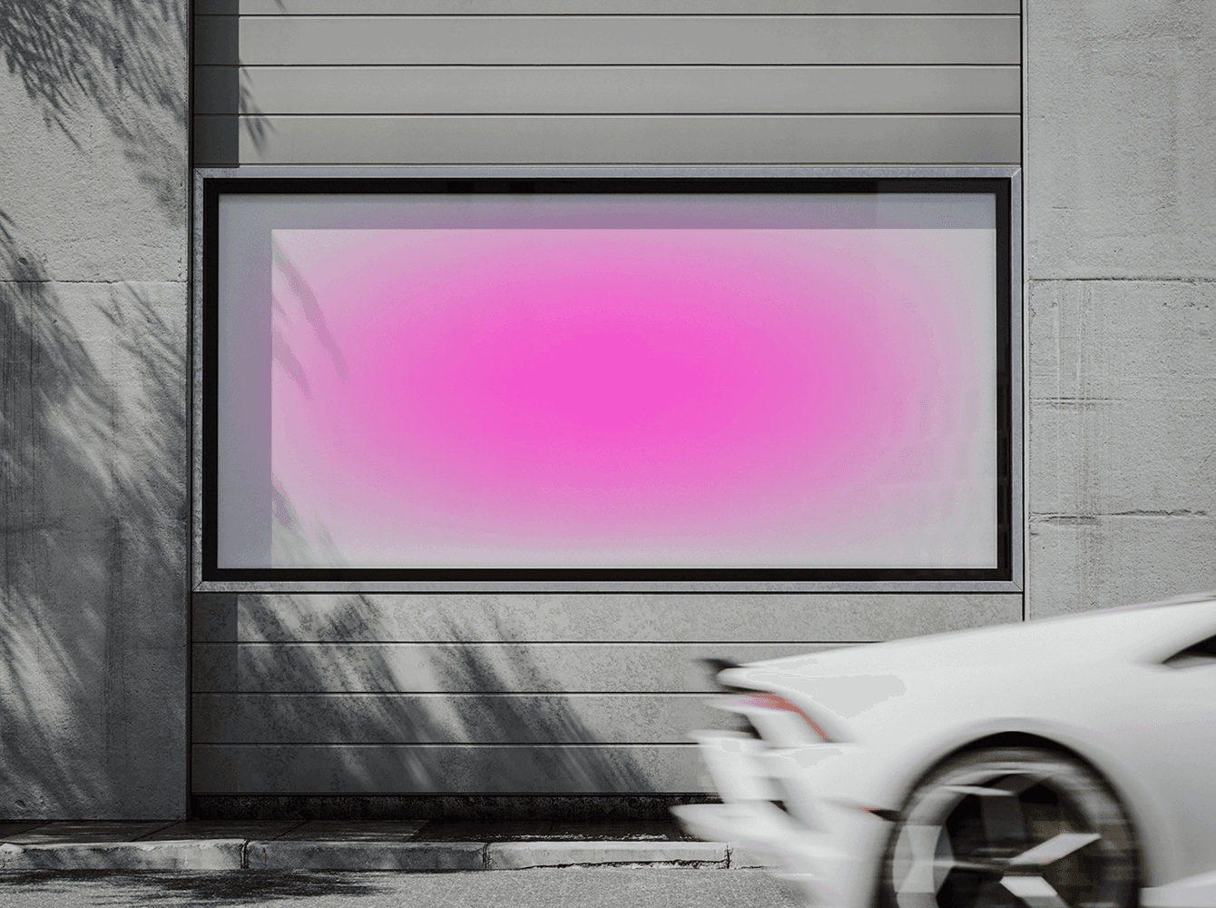 Urban billboard mockup on a gray wall with pink gradient background and white sports car passing by