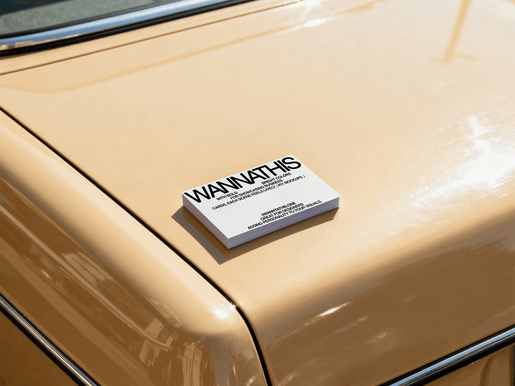 Business card mockup resting on the surface of a car