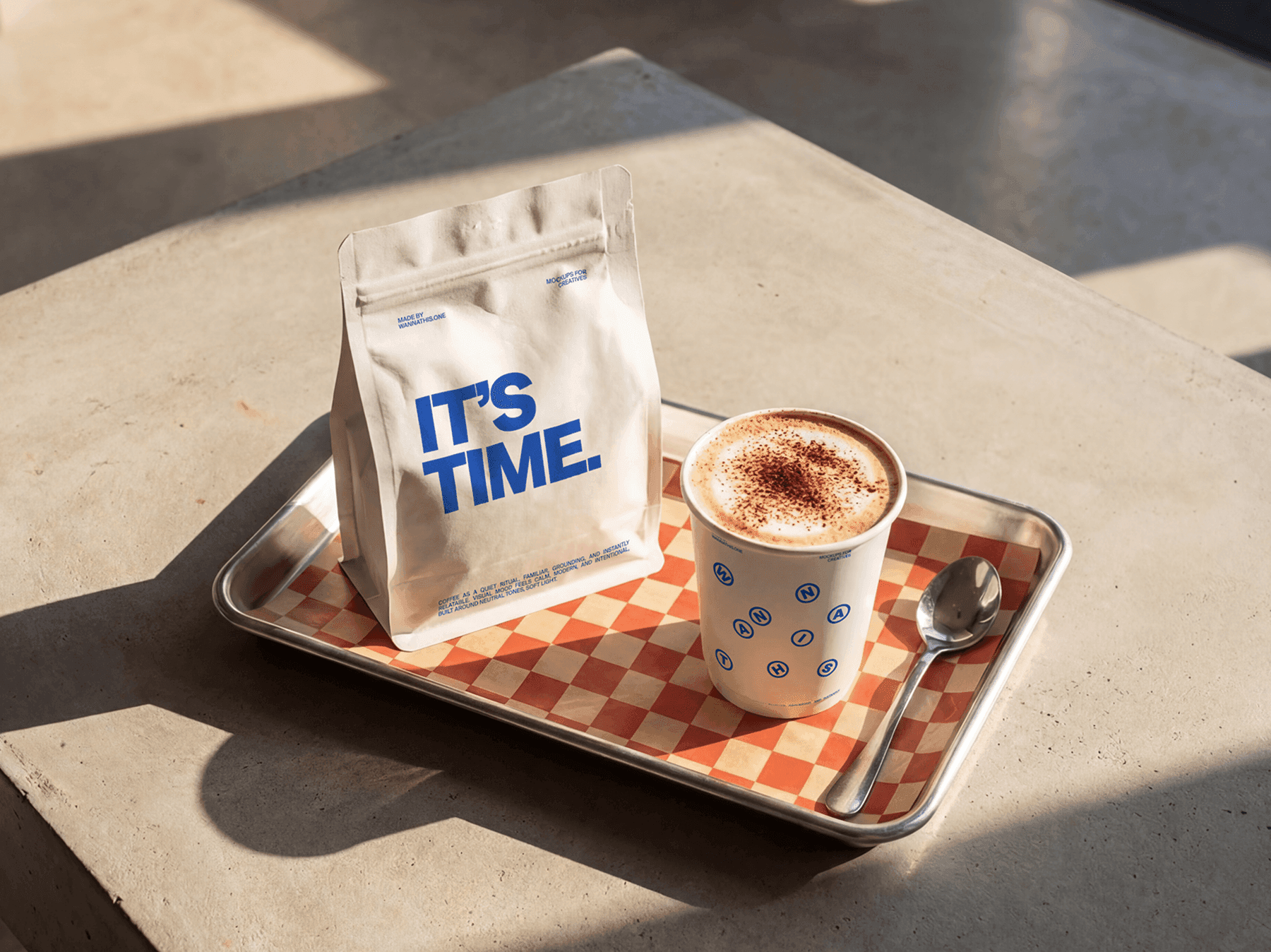 Coffee bag and takeaway cup placed together on a serving tray