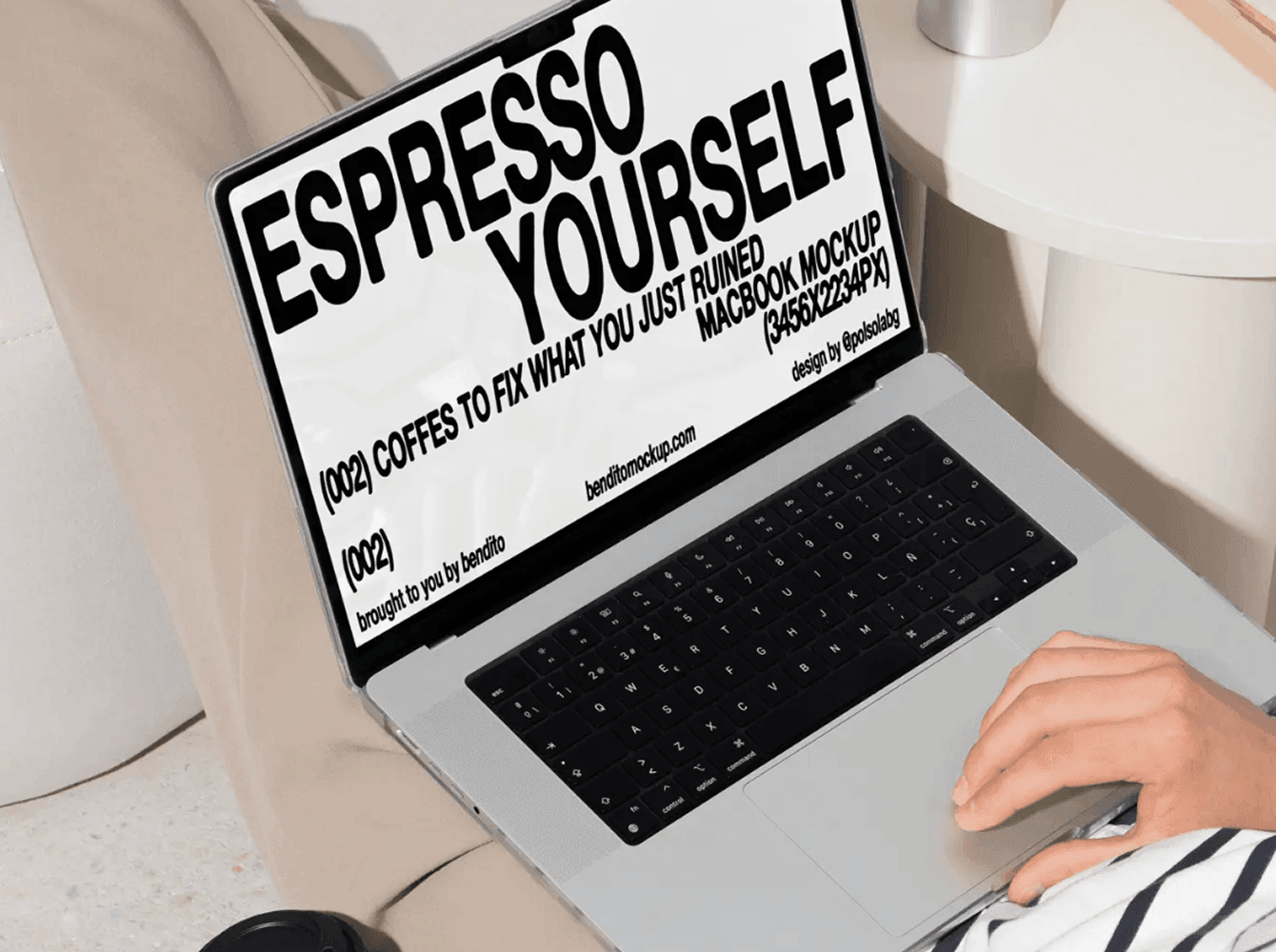 MacBook mockup on sofa with espresso typography and bold black text