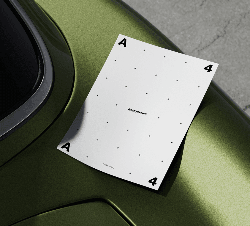 Free A4 paper mockup placed on a reflective green curved surface, ideal for branding or editorial presentations