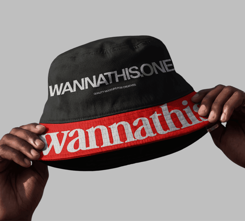 Black bucket hat mockup with embroidered Wannathis logo held in hands close-up