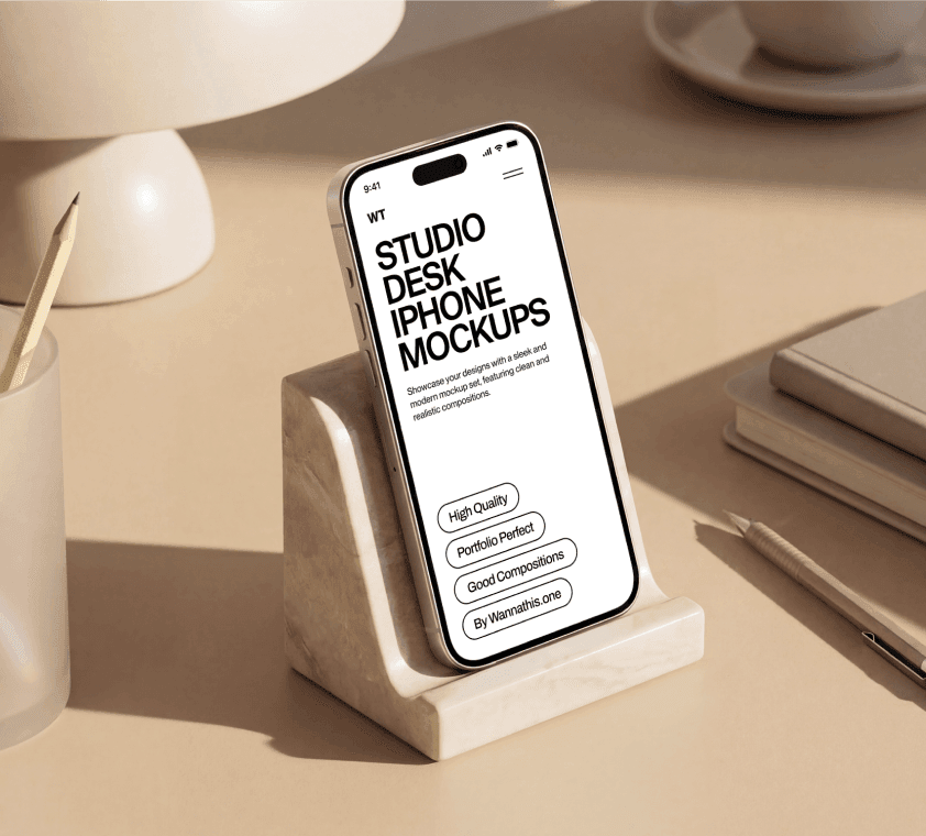 iPhone mockup standing on desk with minimal workspace setup and soft lighting