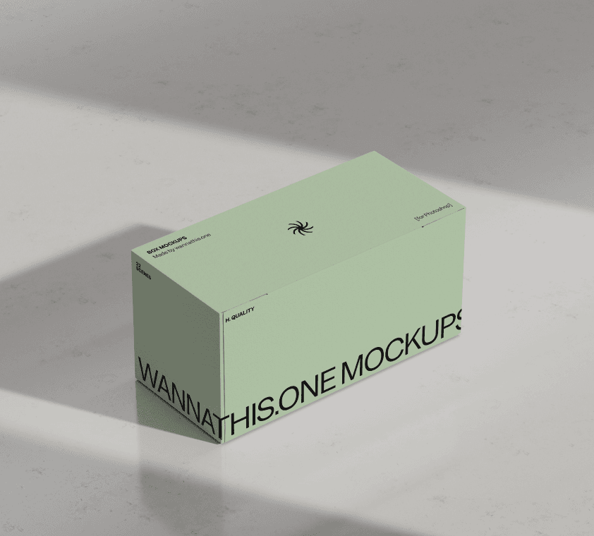 Minimal green product box mockup placed on a light stone surface with realistic shadows