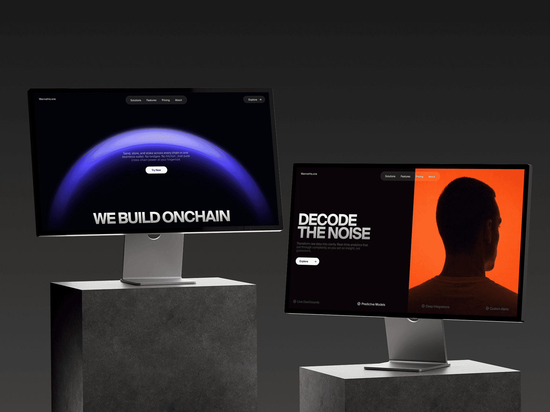 Two Apple Studio Displays placed on separate stands in a studio setup