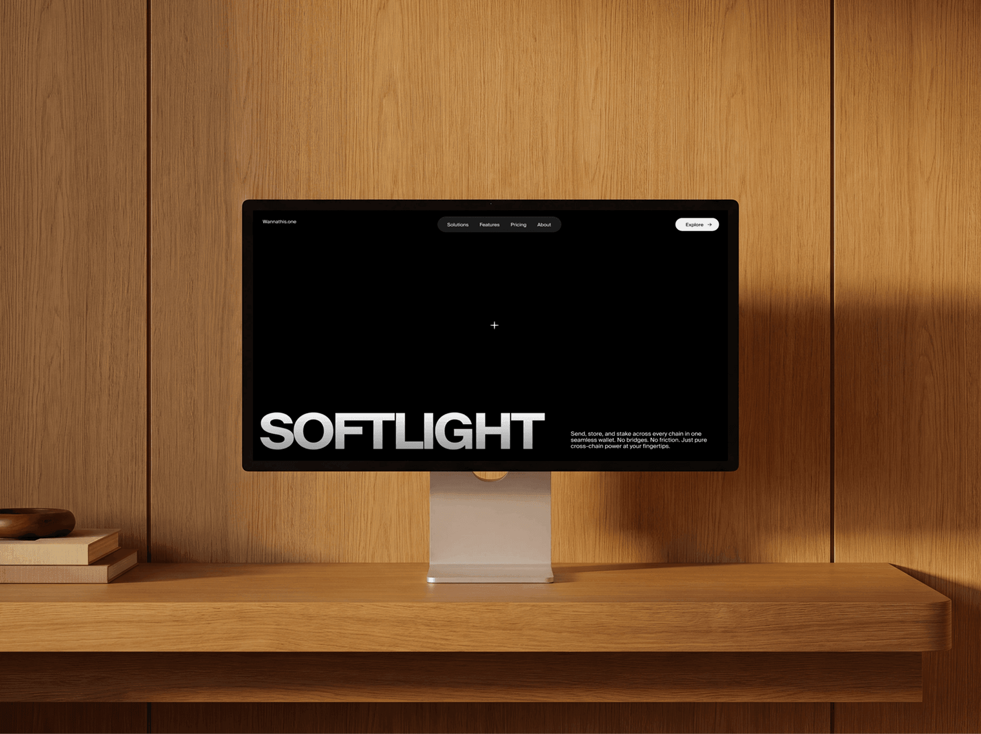 Desktop monitor mockup on a refined floating wooden shelf against a wood wall in soft daylight