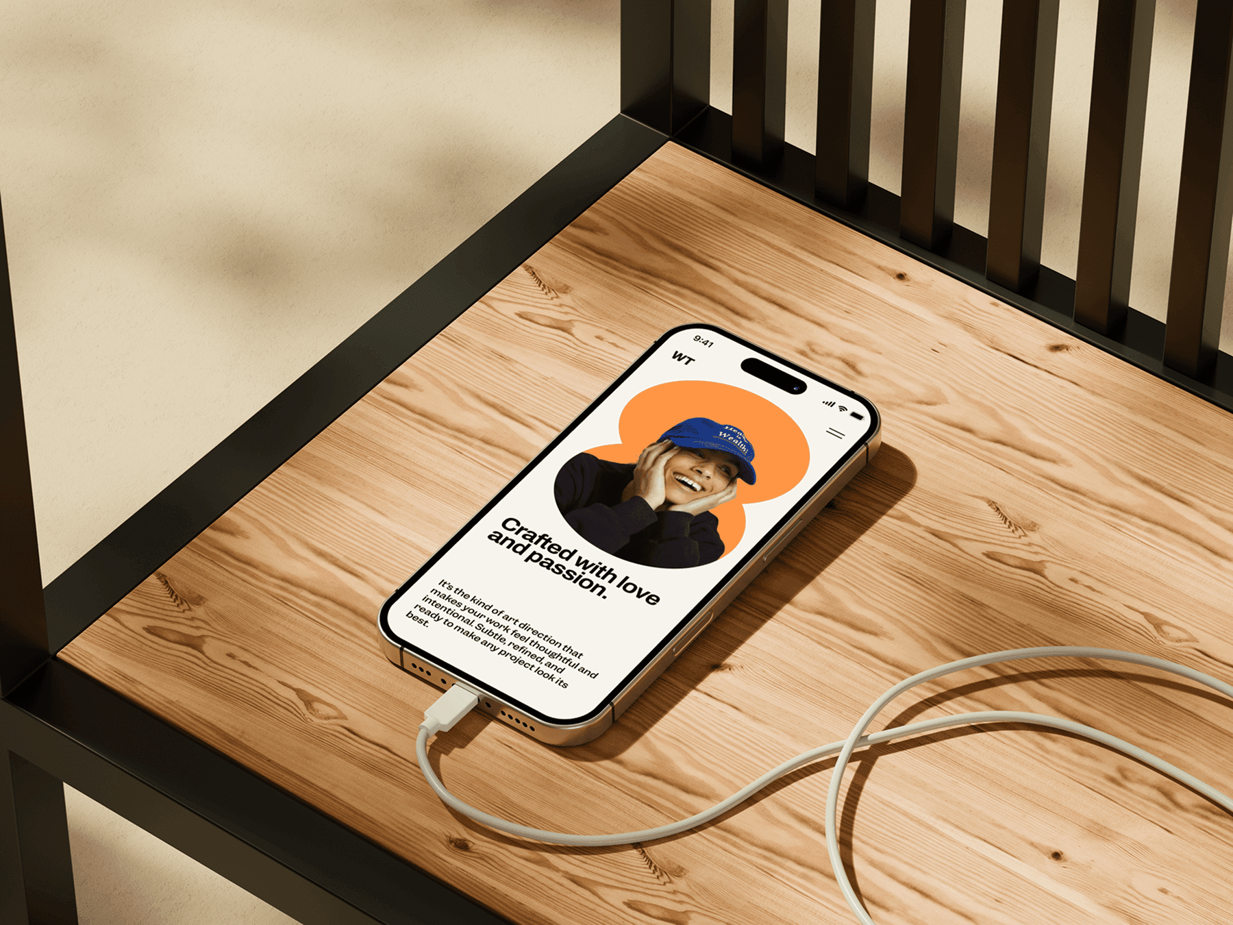 iPhone mockup resting on a wooden bench with charging cable