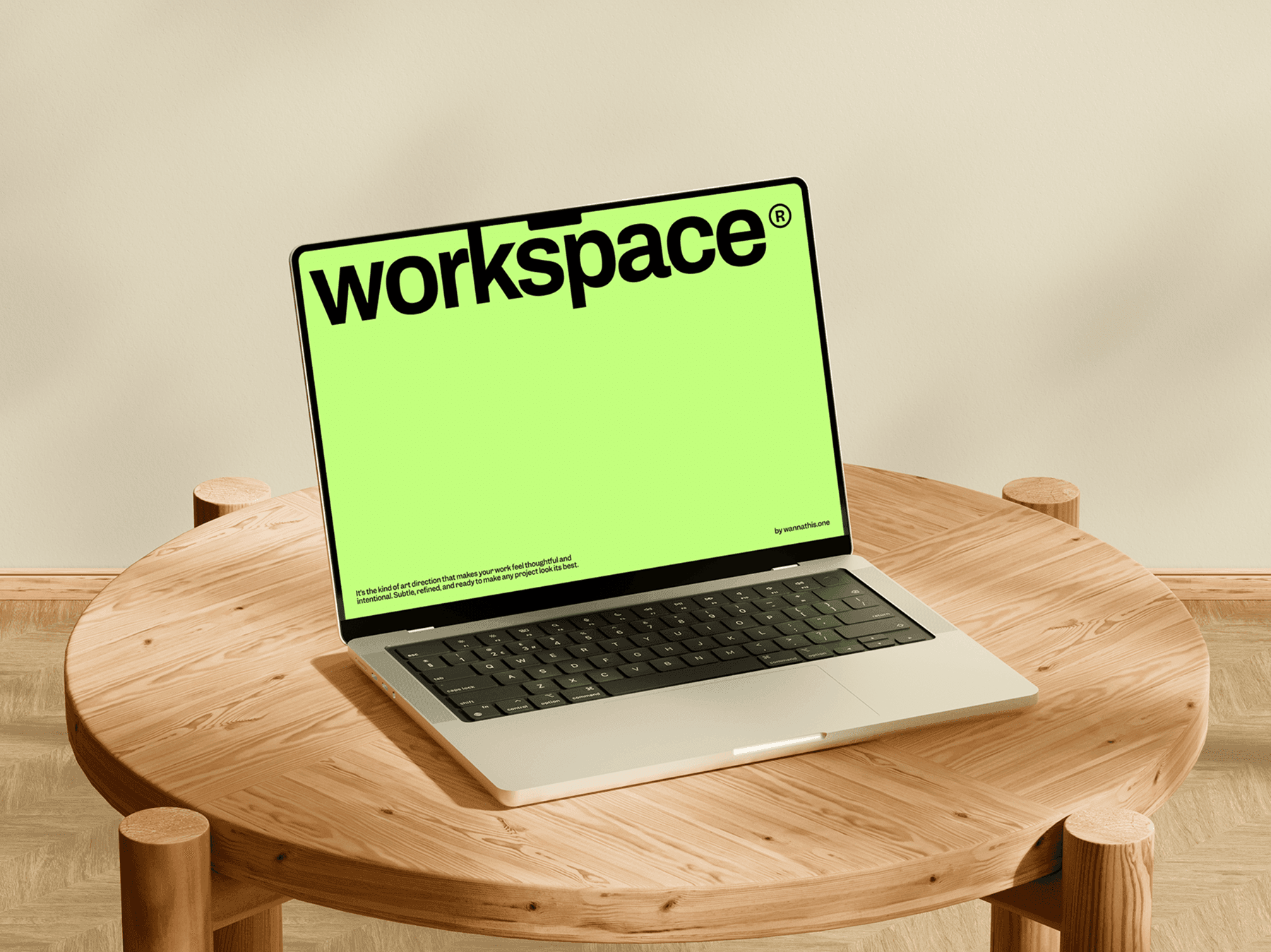 Laptop mockup displayed on a round wooden table