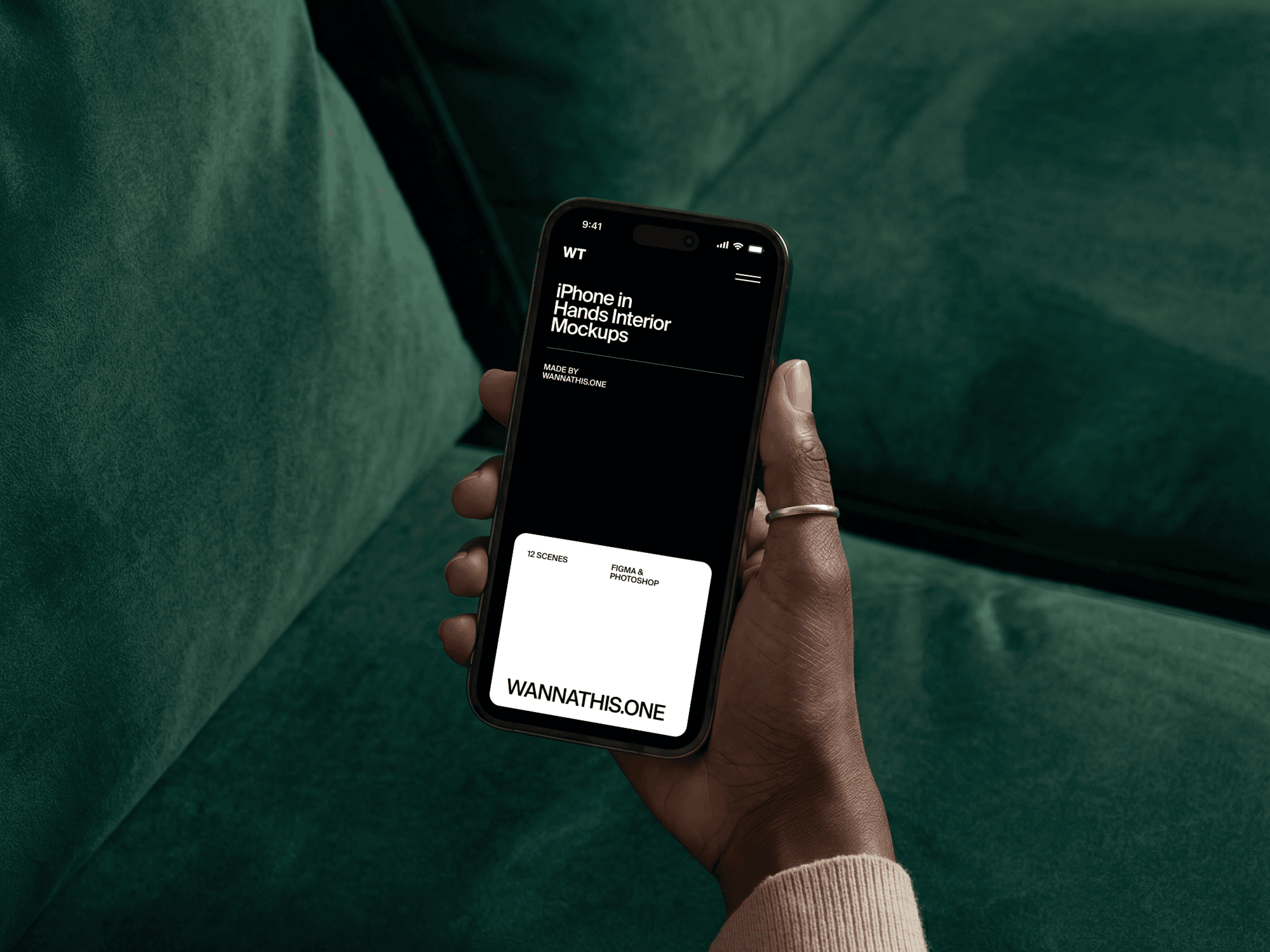 Close-up of a hand holding an iPhone in a lounge environment