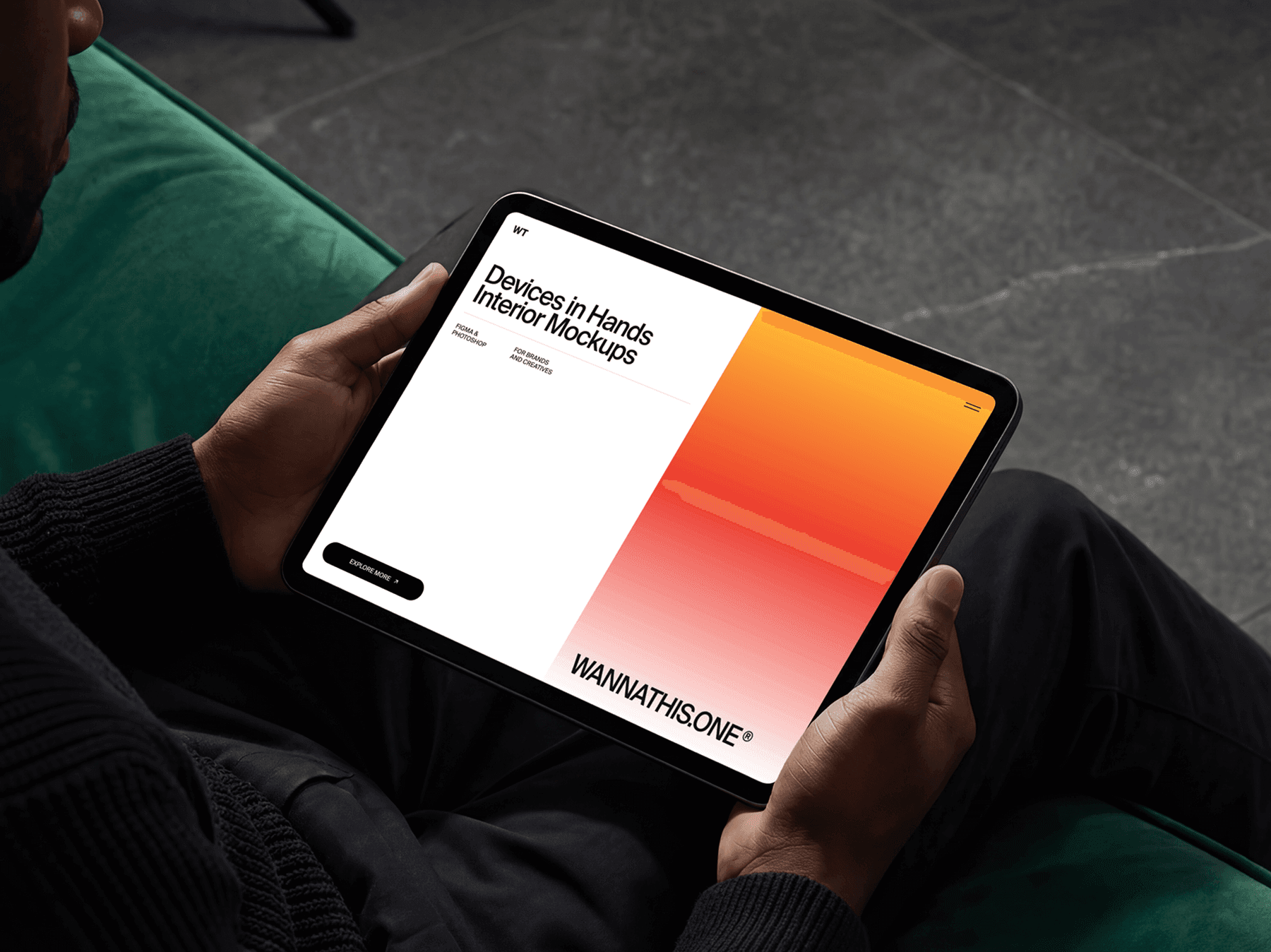 Person holding a tablet in landscape orientation in an indoor setting