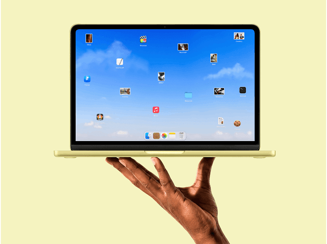 Dockfolio Framer portfolio template on a MacBook held in a hand, a macOS desktop layout with scattered file icons, a playful template for creative portfolios