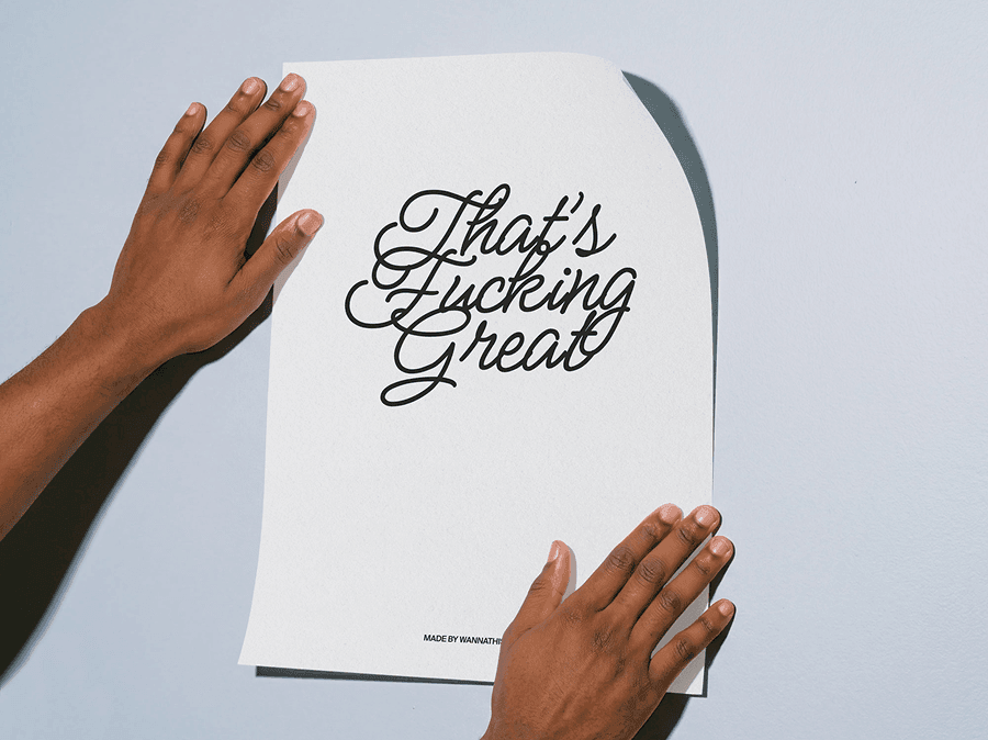 Hands holding a curved editorial poster mockup against a refined wall in a clean minimal studio scene