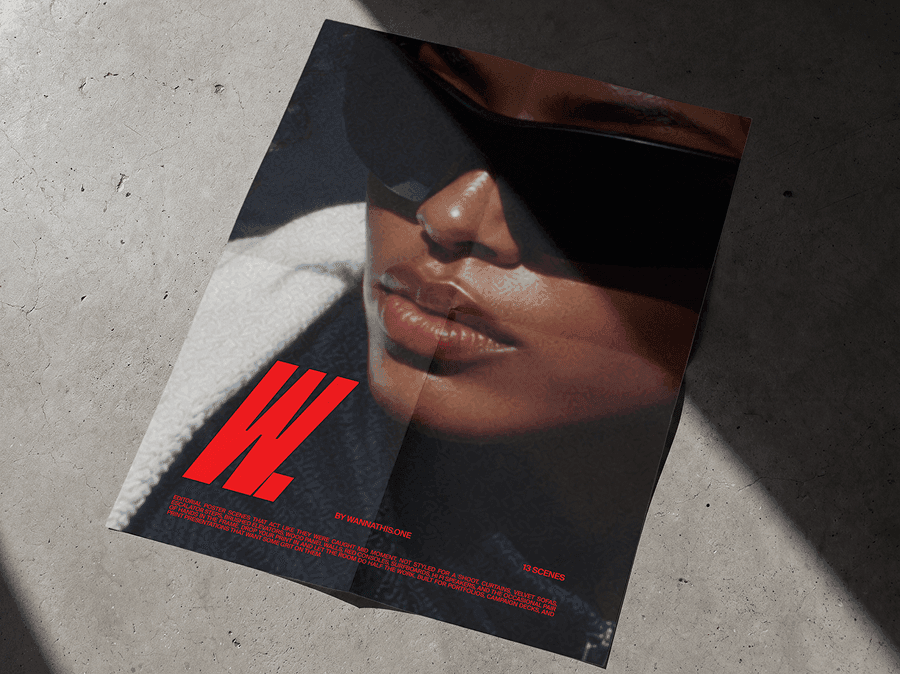 Fashion editorial poster mockup placed on a raw concrete floor with sharp realistic shadows in modern scene