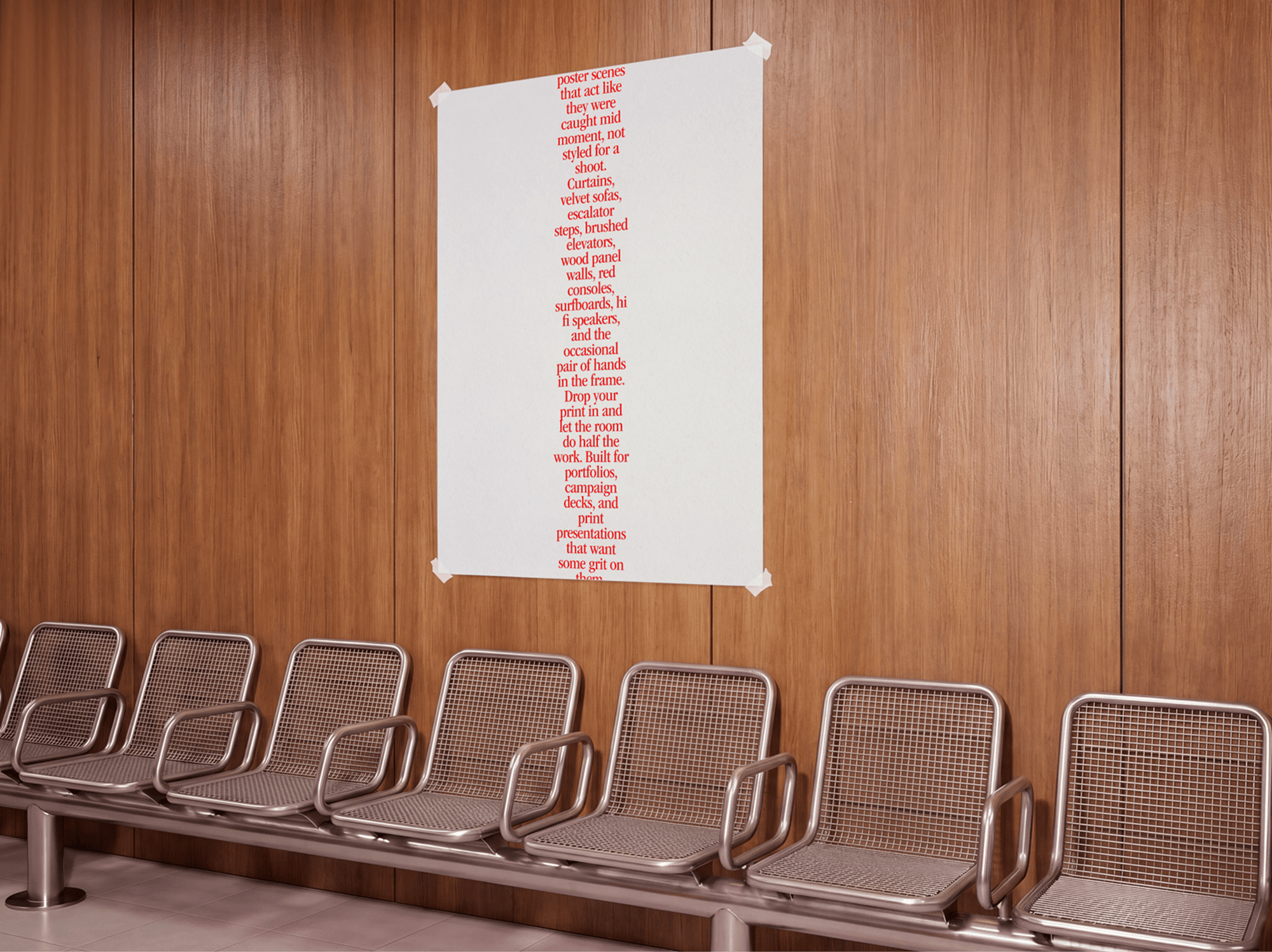 Vertical poster mockup attached to a warm wooden wall above refined metal chairs in a clean waiting area scene