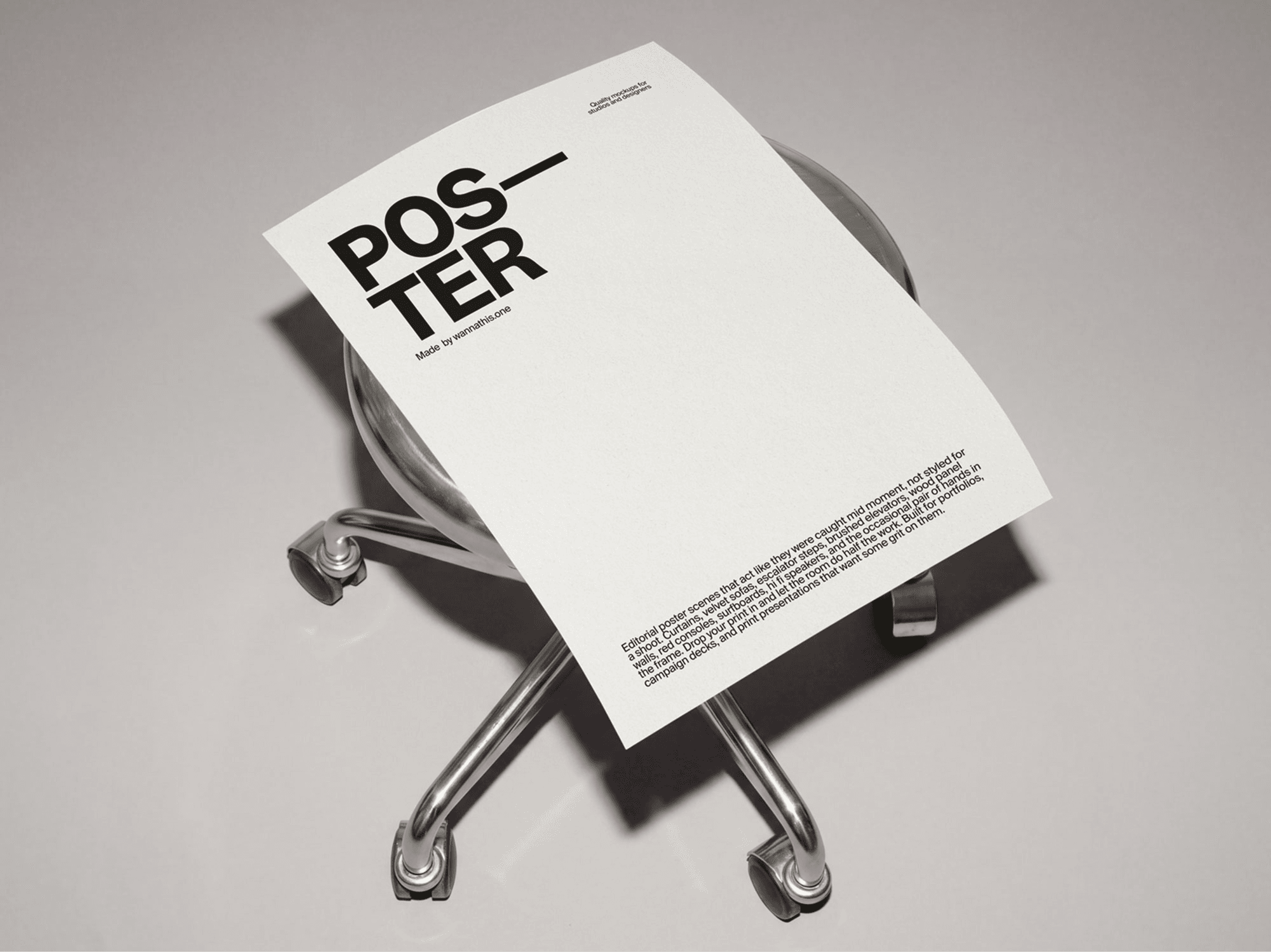 Editorial poster mockup placed on a refined modern office chair seat in a clean minimal studio scene
