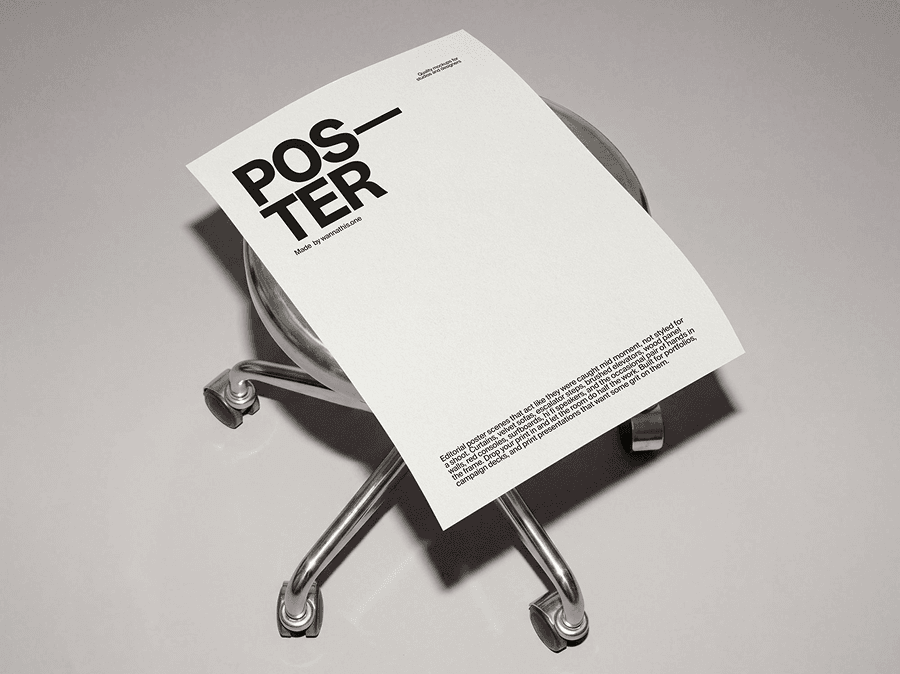 Editorial poster mockup placed on a refined modern office chair seat in a clean minimal studio scene