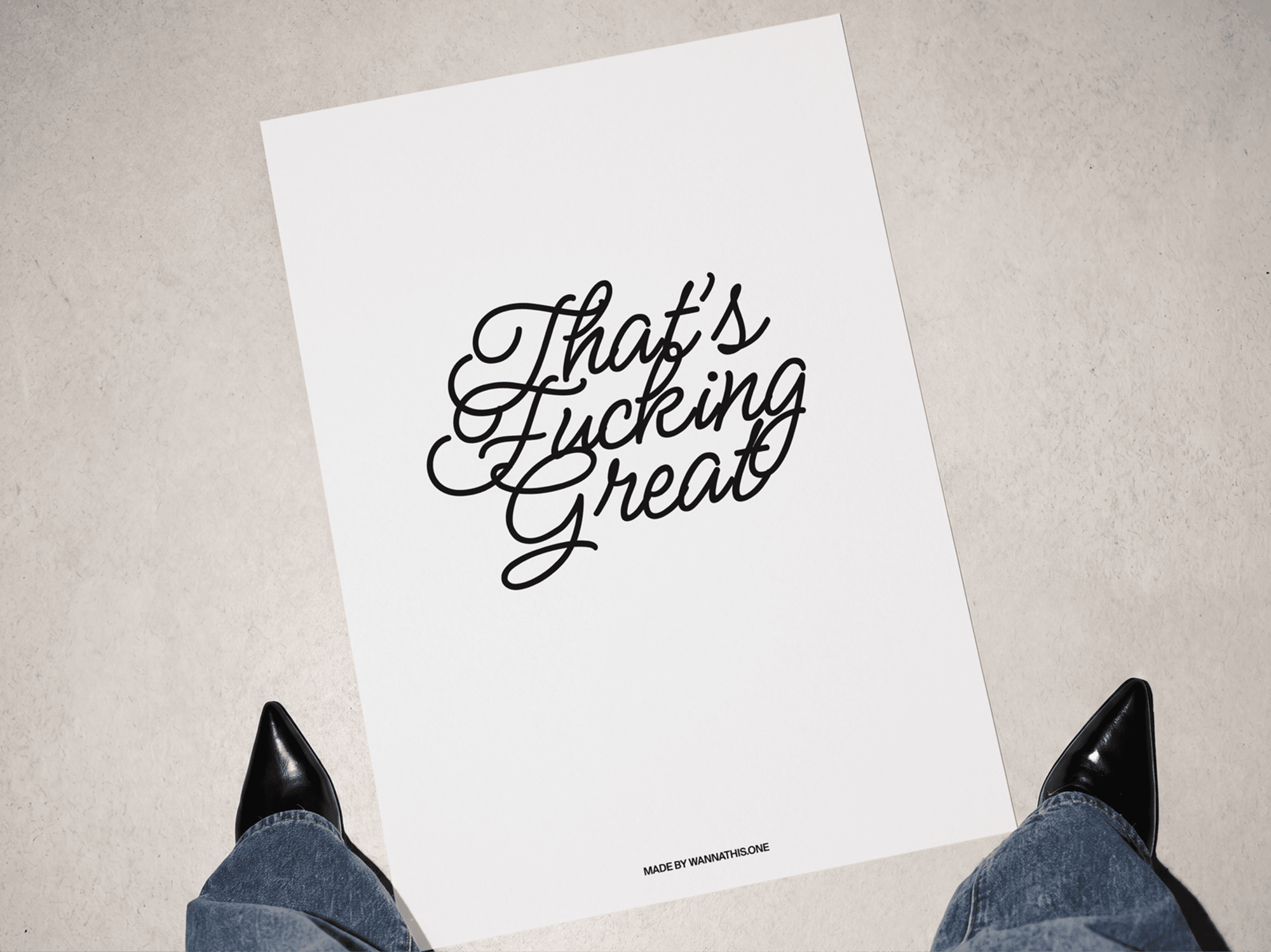 Large editorial poster mockup displayed flat on the floor from a refined top down perspective angle