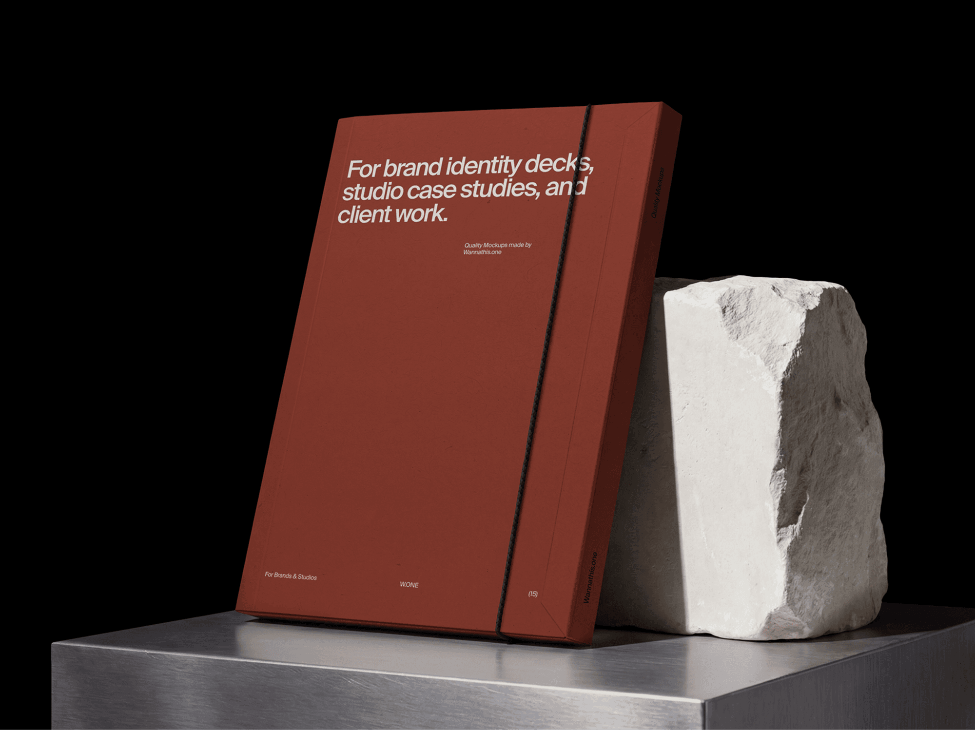 Standing presentation folder mockup on a display platform beside a decorative stone in a refined product studio scene