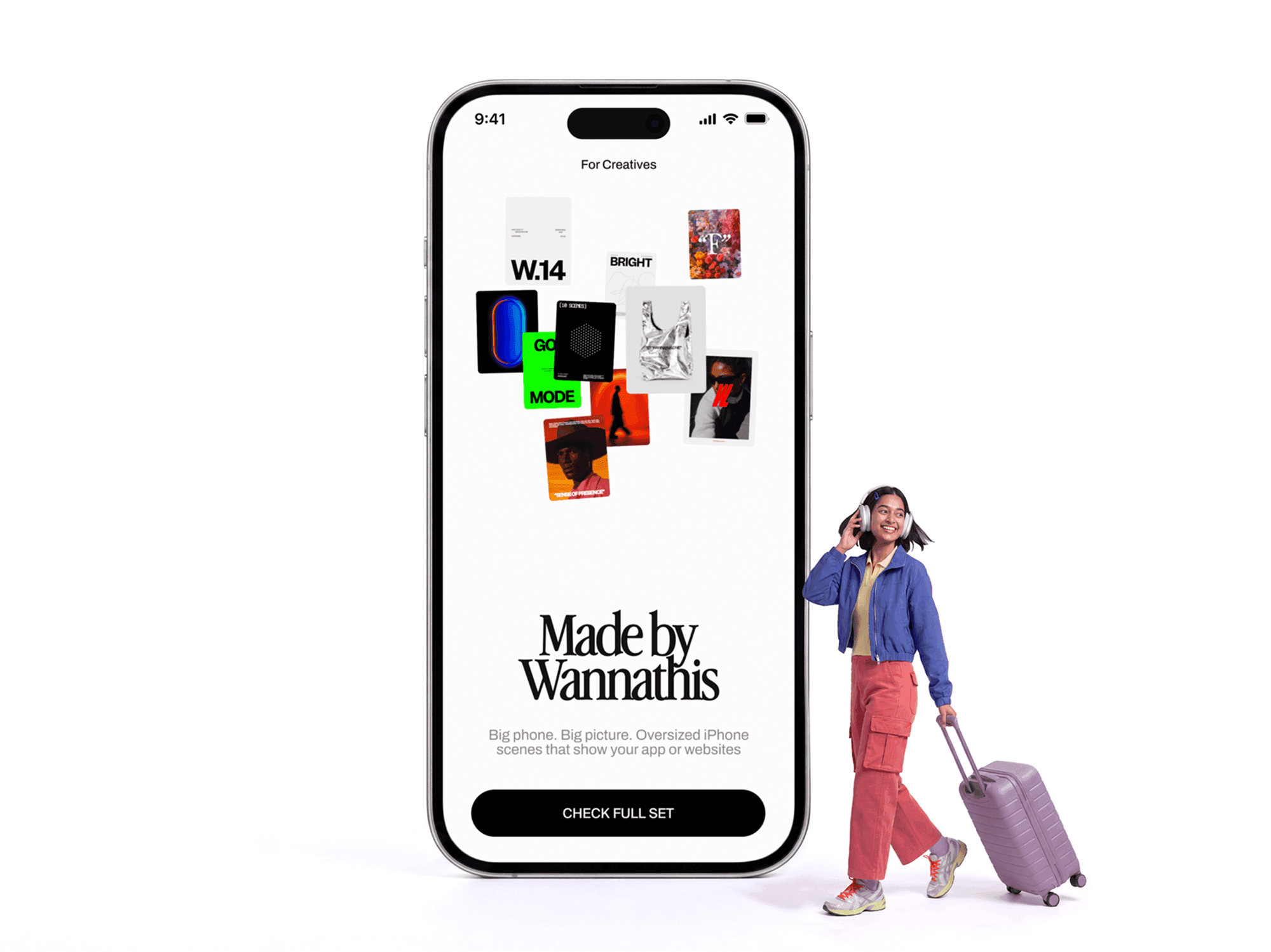 Oversized iPhone standing upright with a person wheeling a suitcase past it