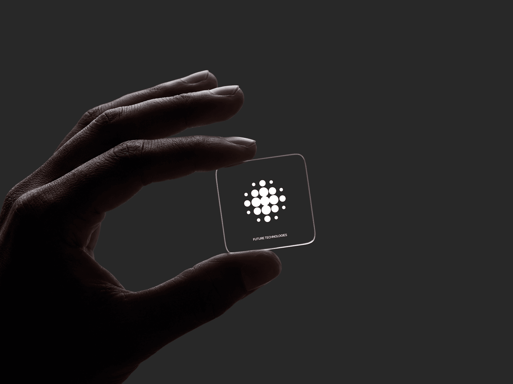 Hand presenting a transparent glass card with a floating effect