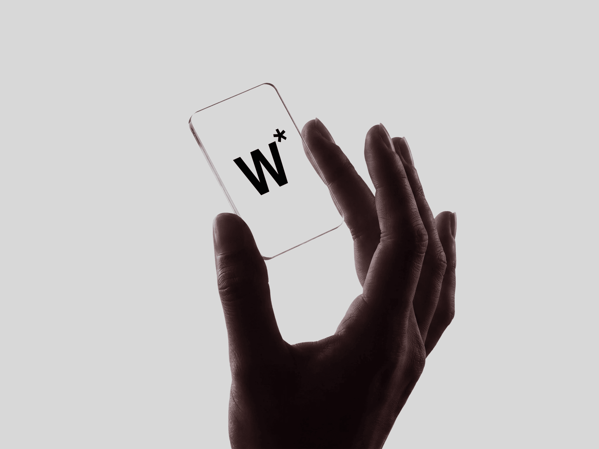 Hand holding a vertical transparent glass card mockup with a pinch grip in a clean refined studio scene