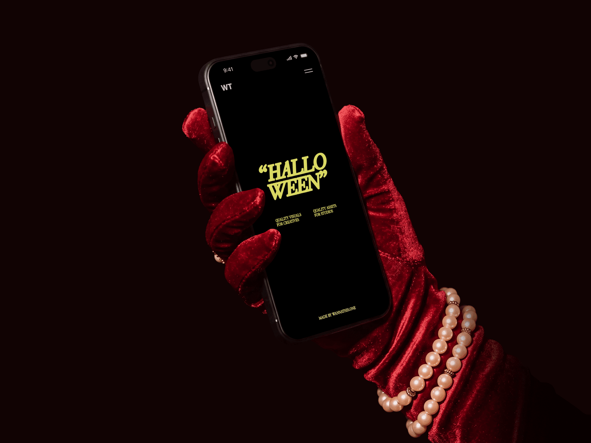 iPhone mockup held in a black velvet glove with pearl bracelets at the wrist