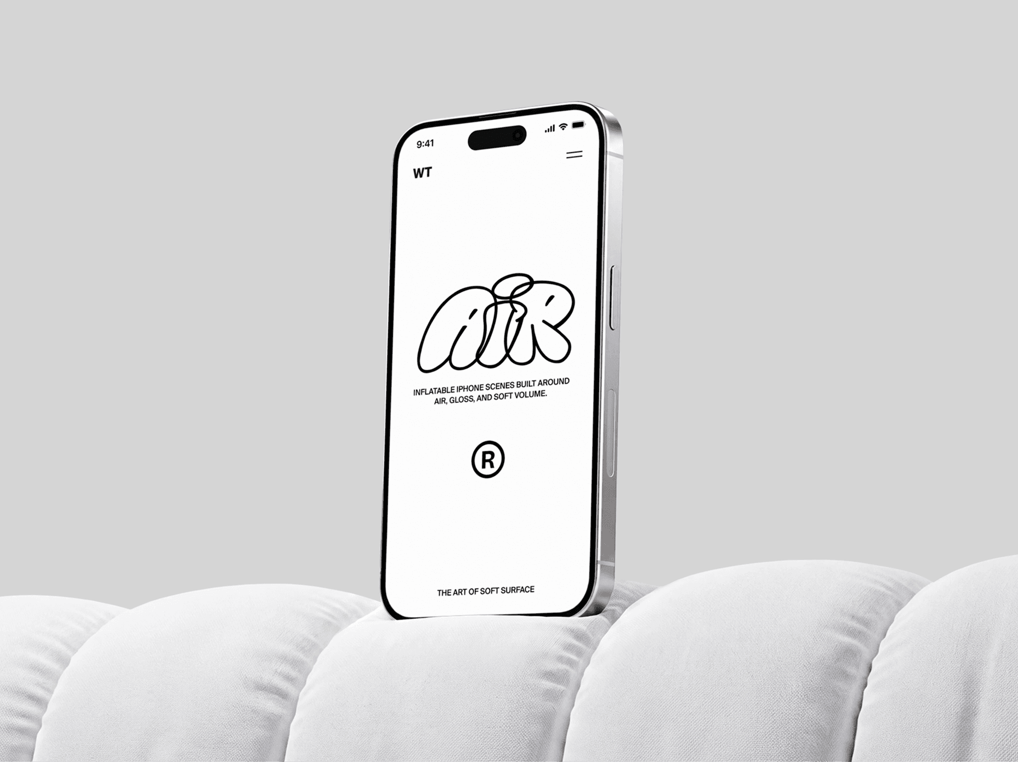 Folded inflatable cushion with an iPhone mockup standing upright on the edge