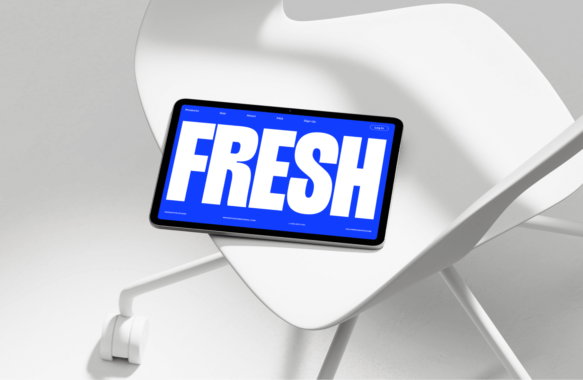 Free Tablet Mockup on Modern White Chair for app presentations