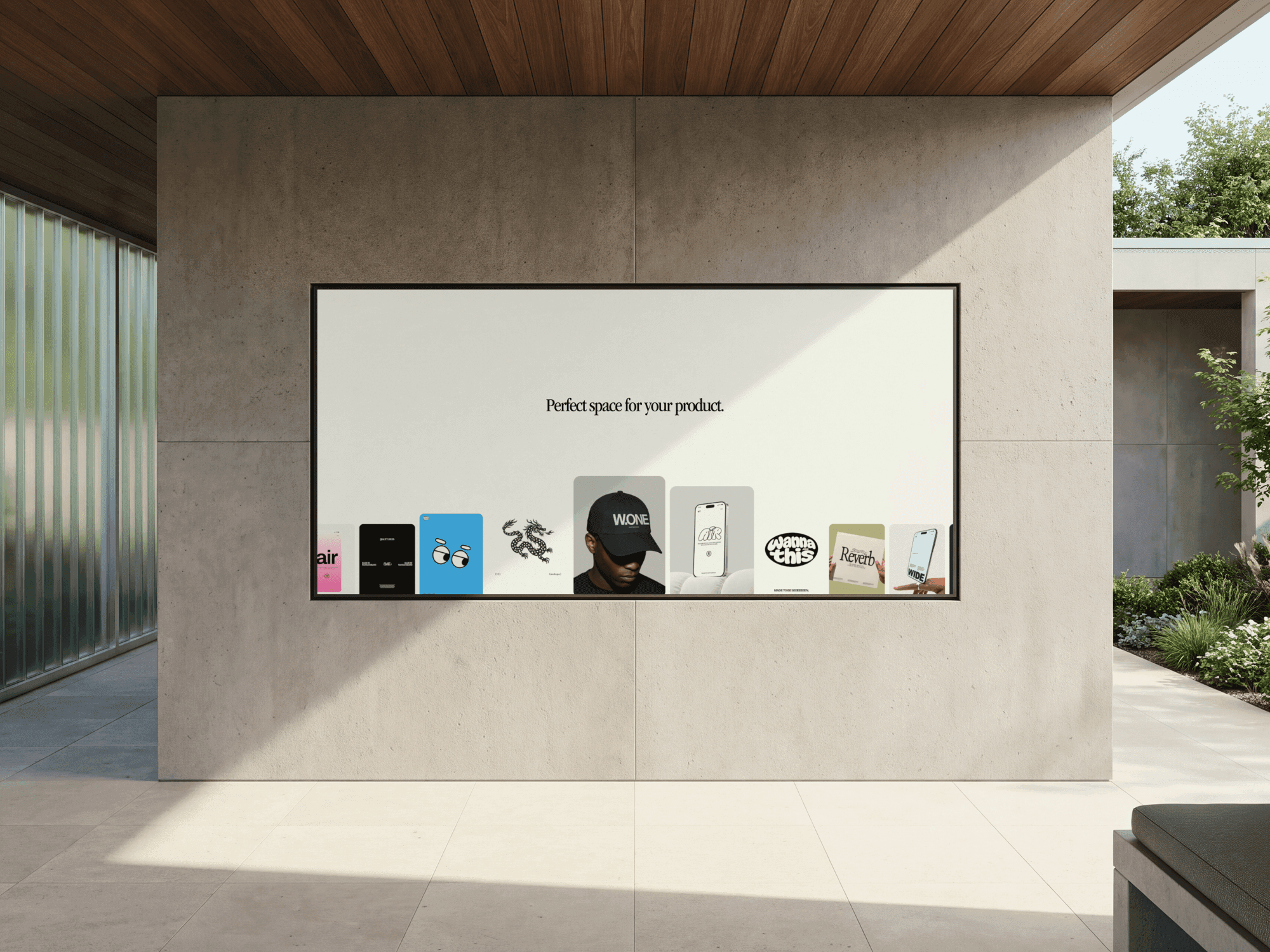 Wide billboard mounted on a raw concrete wall in an open indoor space