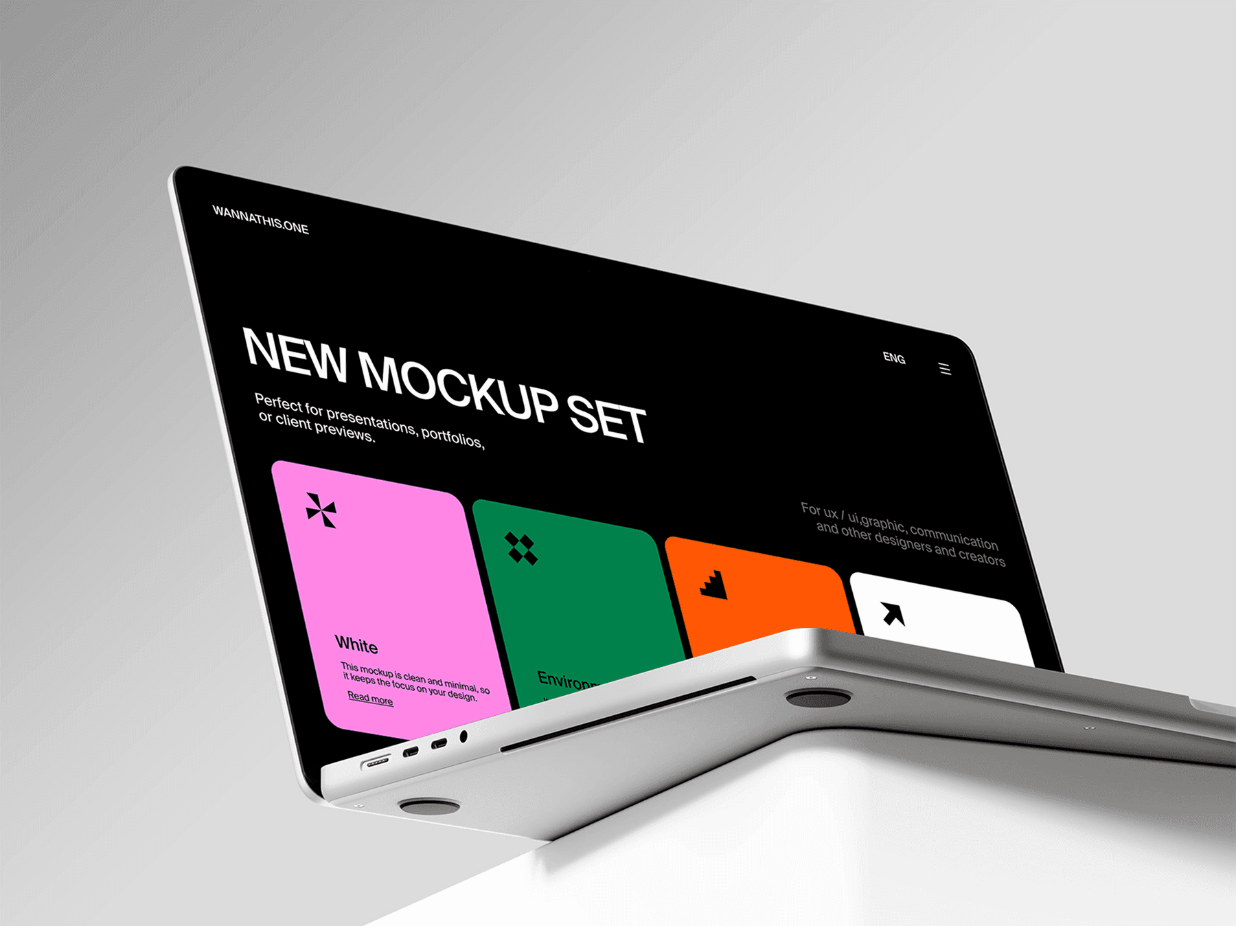MacBook mockup slightly tilted on the edge of a white desk
