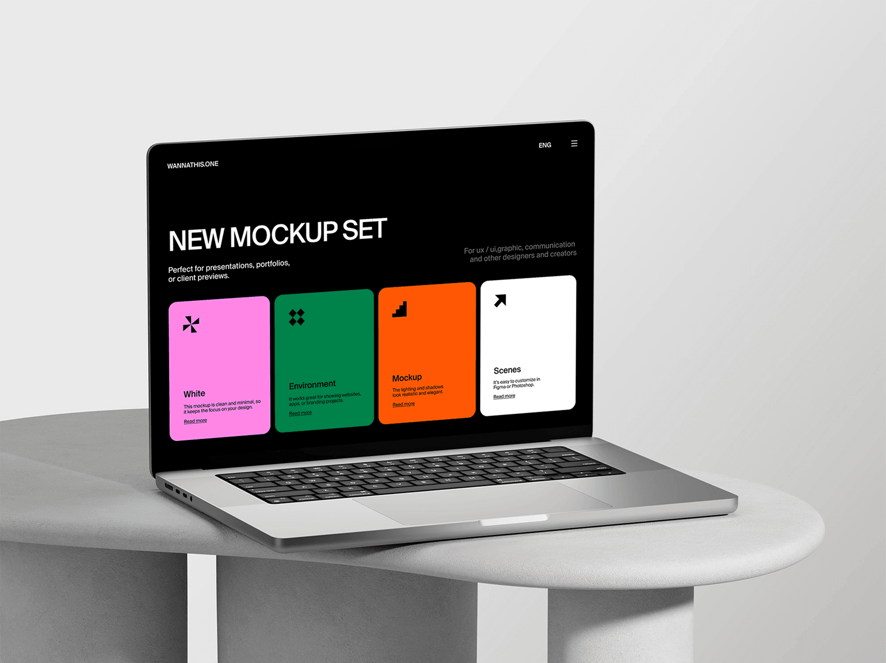 MacBook mockup displayed on a smooth rounded white table