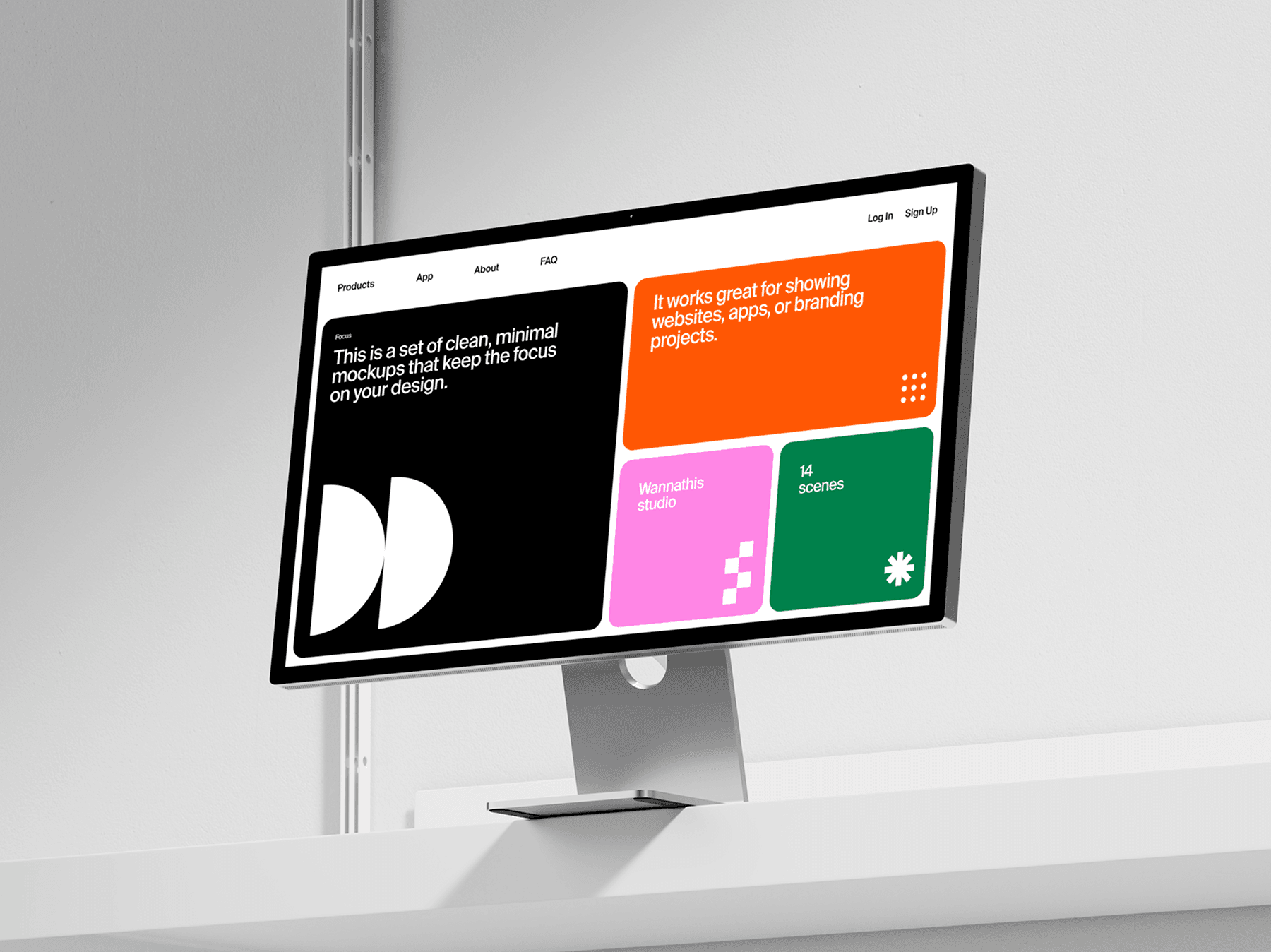 Desktop monitor mockup standing on a white table in a minimal workspace