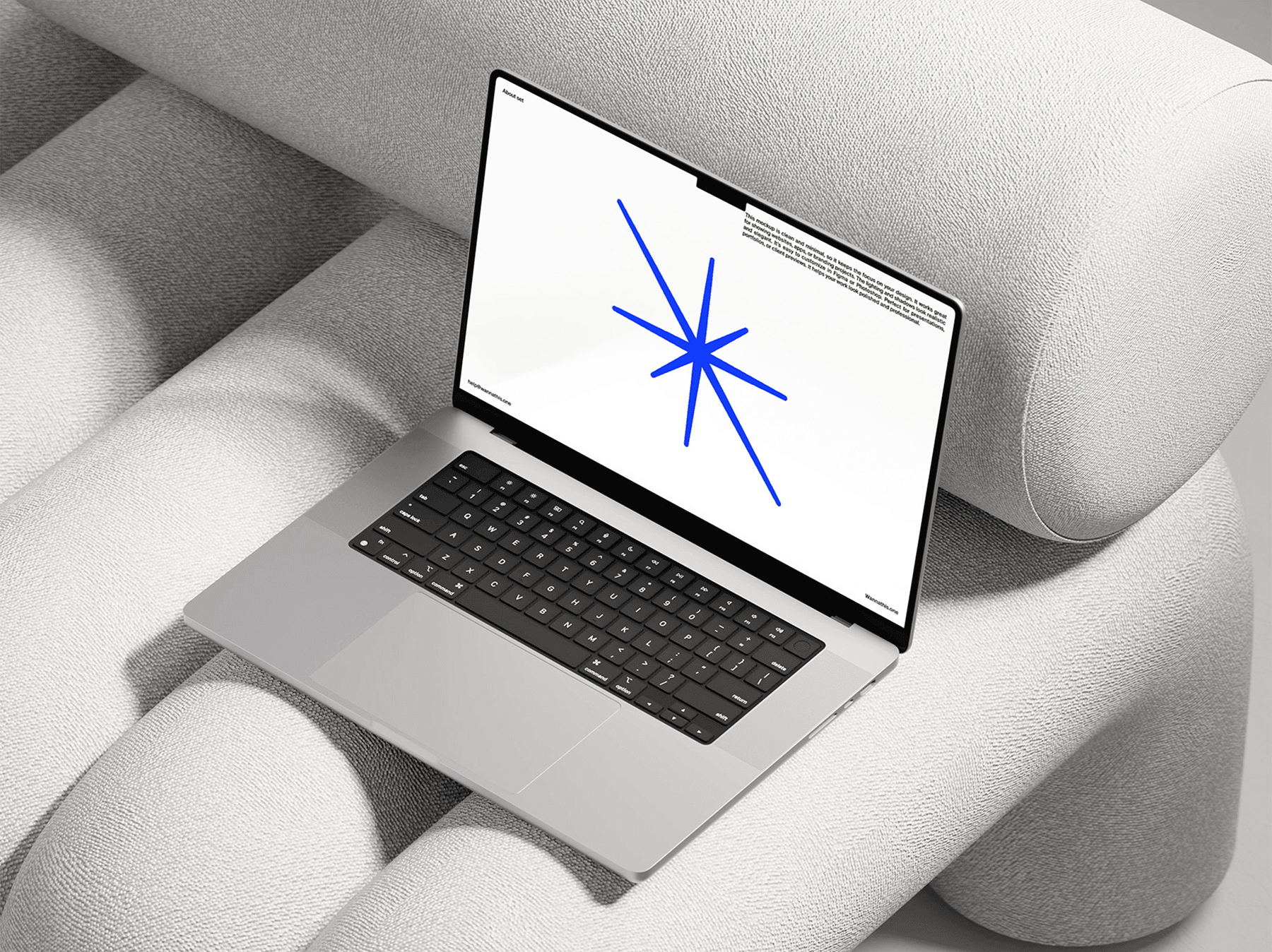MacBook mockup placed on a soft white sofa with natural light