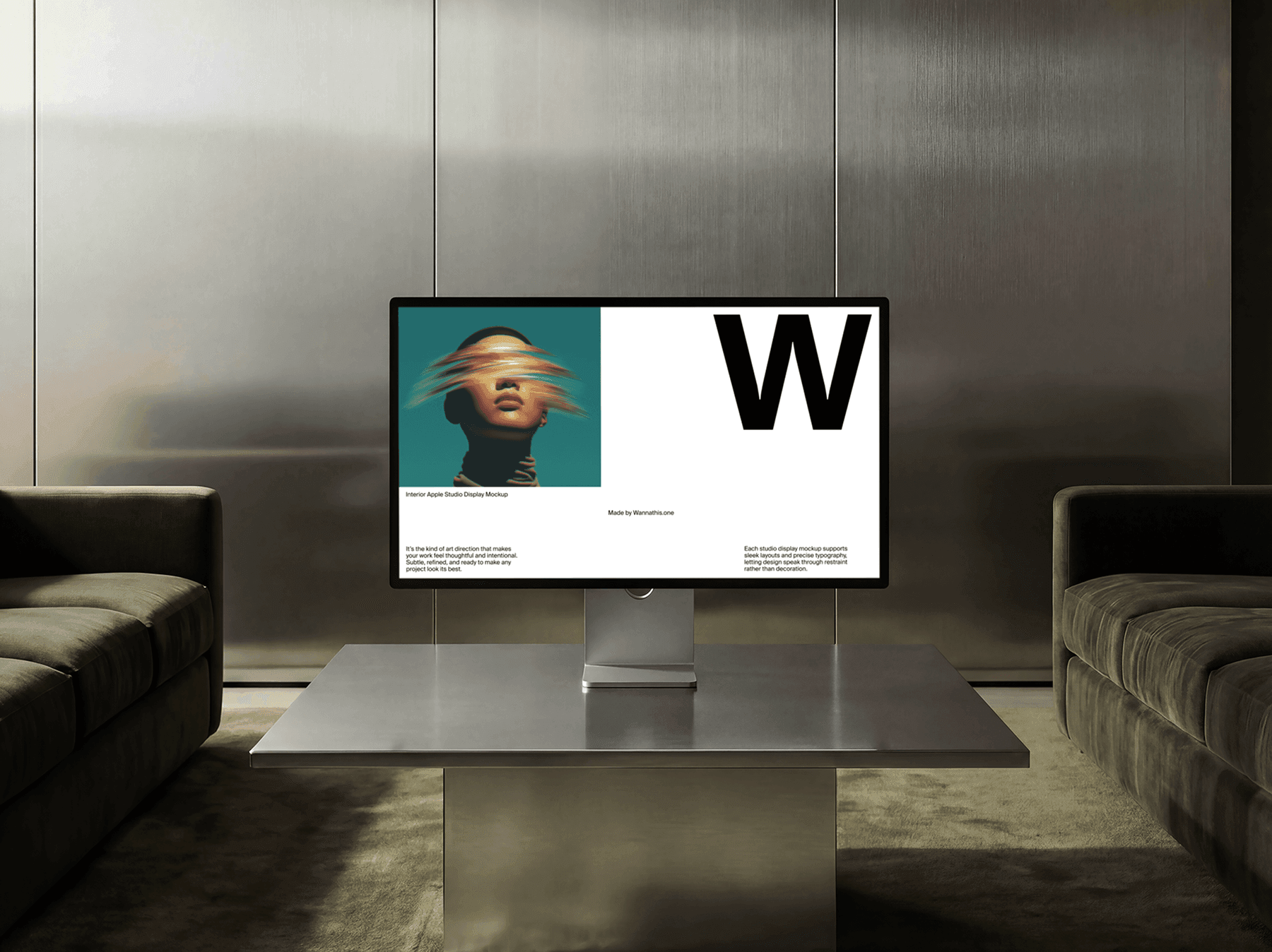 Studio display monitor placed on a central table between two sofas