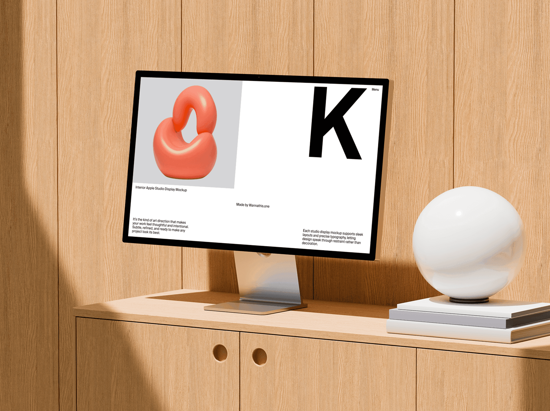 Studio display monitor placed on a wooden cabinet in a modern interior