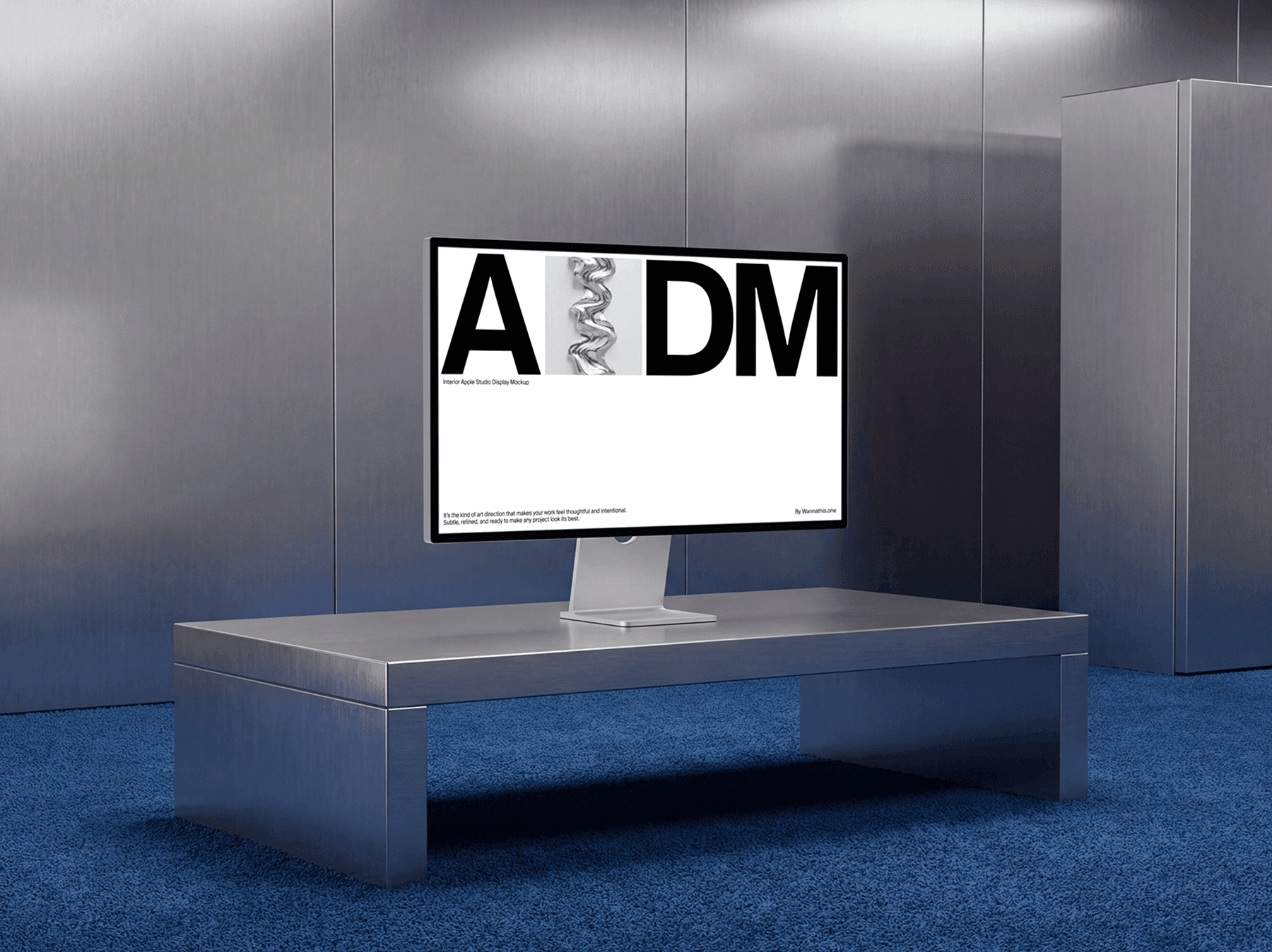 Studio display monitor placed on a low table in a modern interior setting