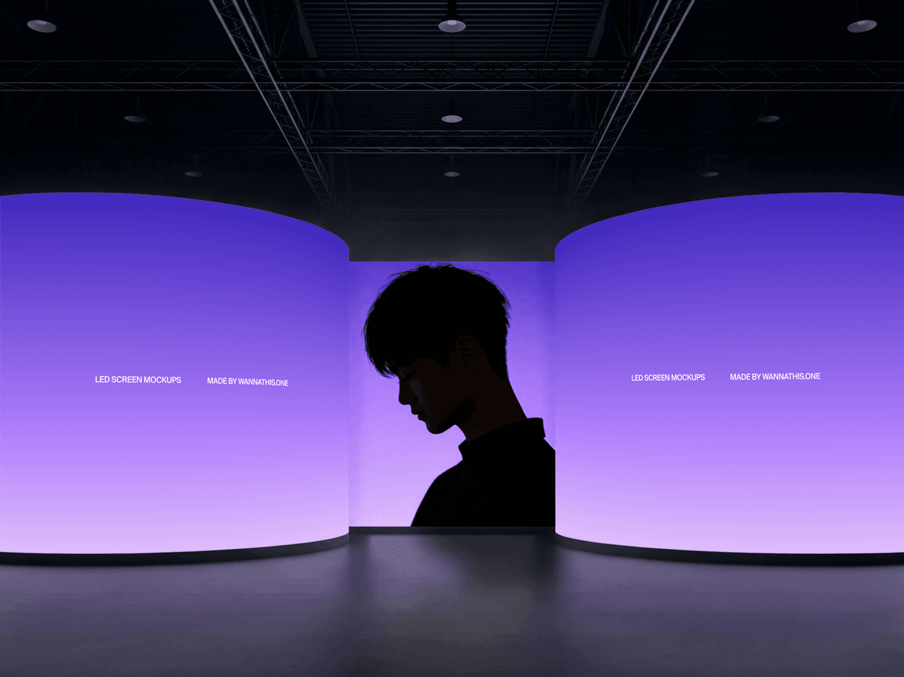 Two curved LED screens facing each other in a modern interior space