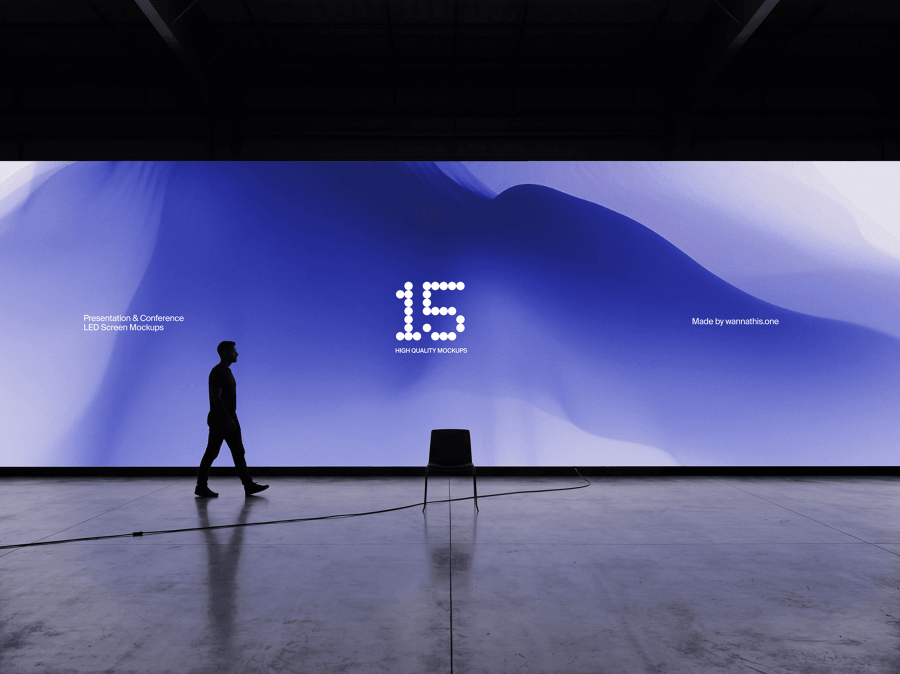 Wide LED screen installed in a large industrial indoor space