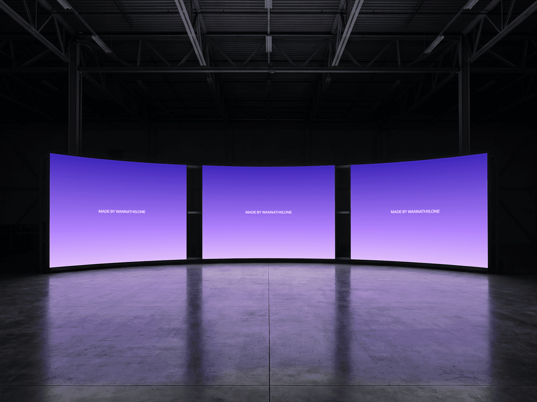 Three curved LED screens arranged side by side in a large interior space