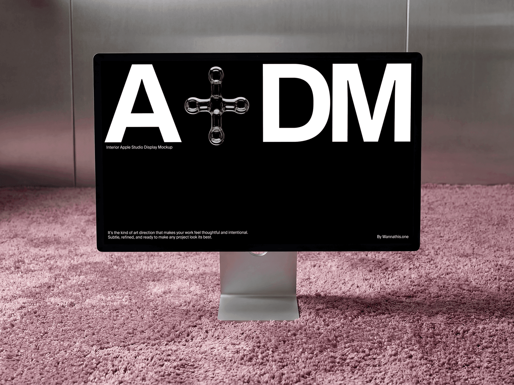 Front view of a wide studio display monitor in a modern interior