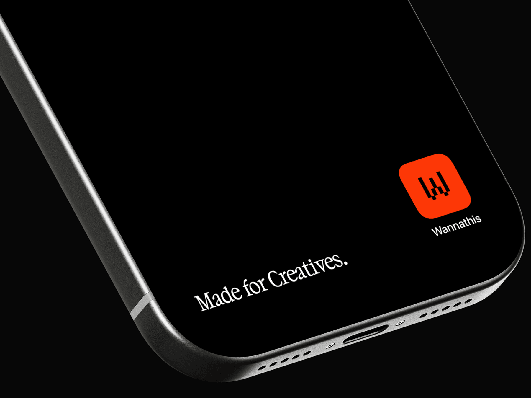 Close crop of an iPhone bottom edge with screen and frame visible