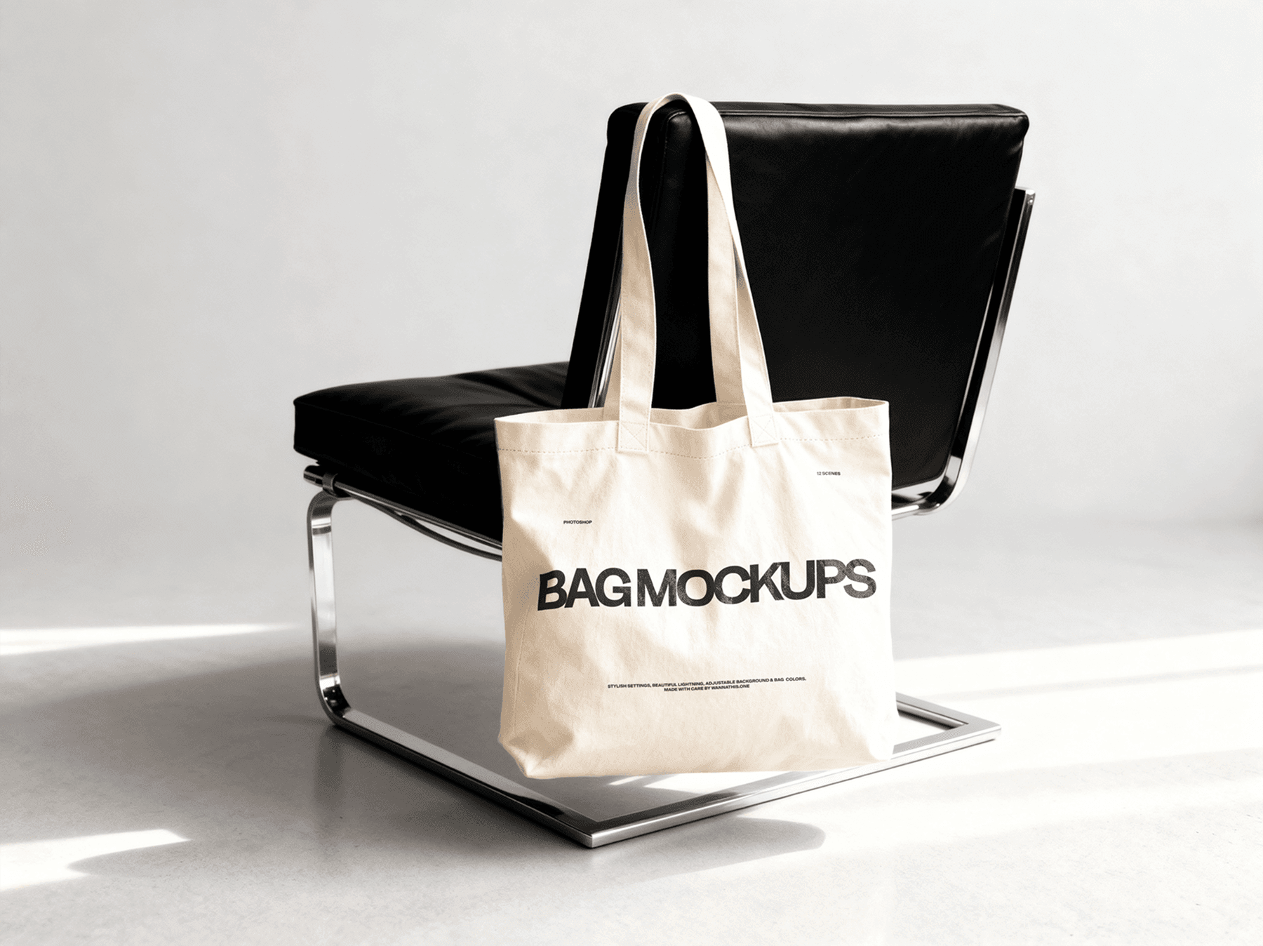 Tote bag mockup placed in front of a modern chair in a studio setting